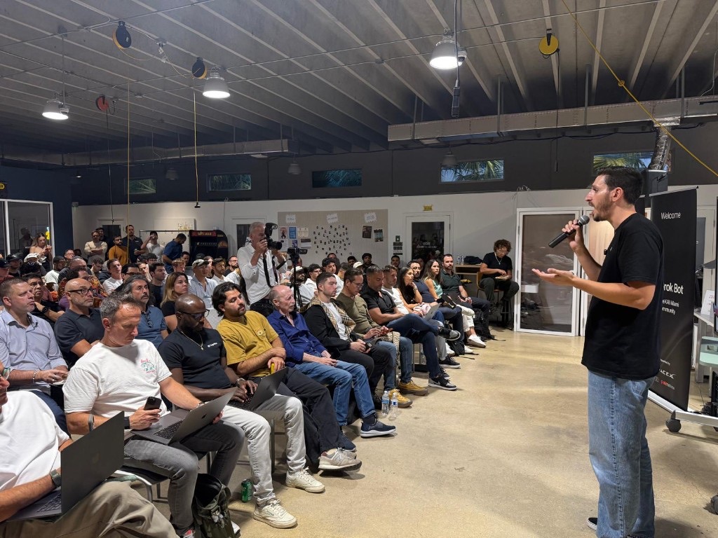 Ben Milshtein speaking to a full room at the Grok Bot Miami Kickoff, The DOCK, Wynwood